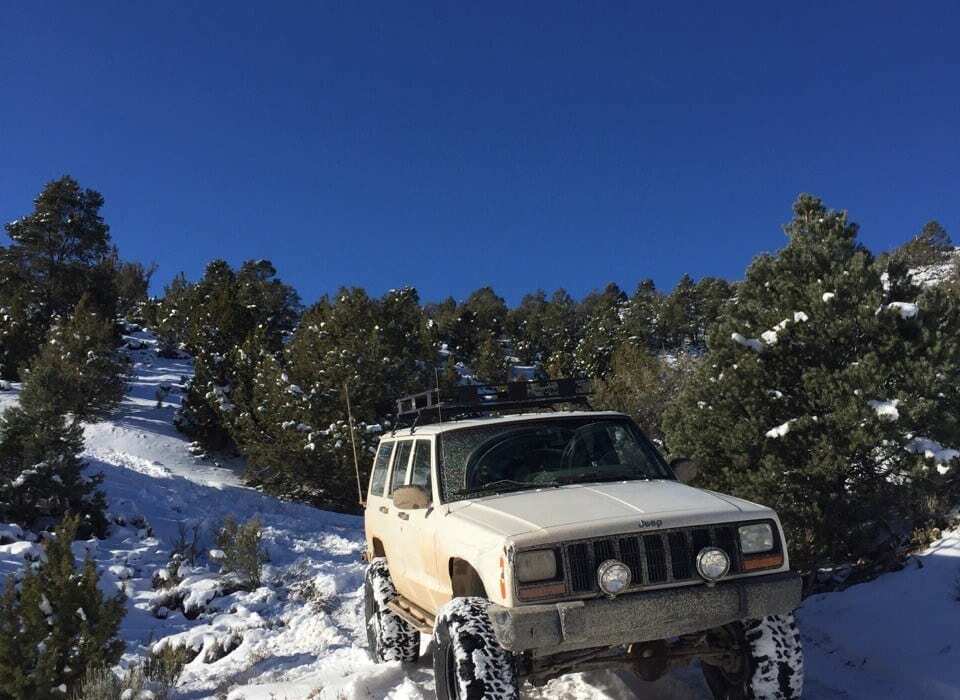 Jeep in snow on off-roading trip