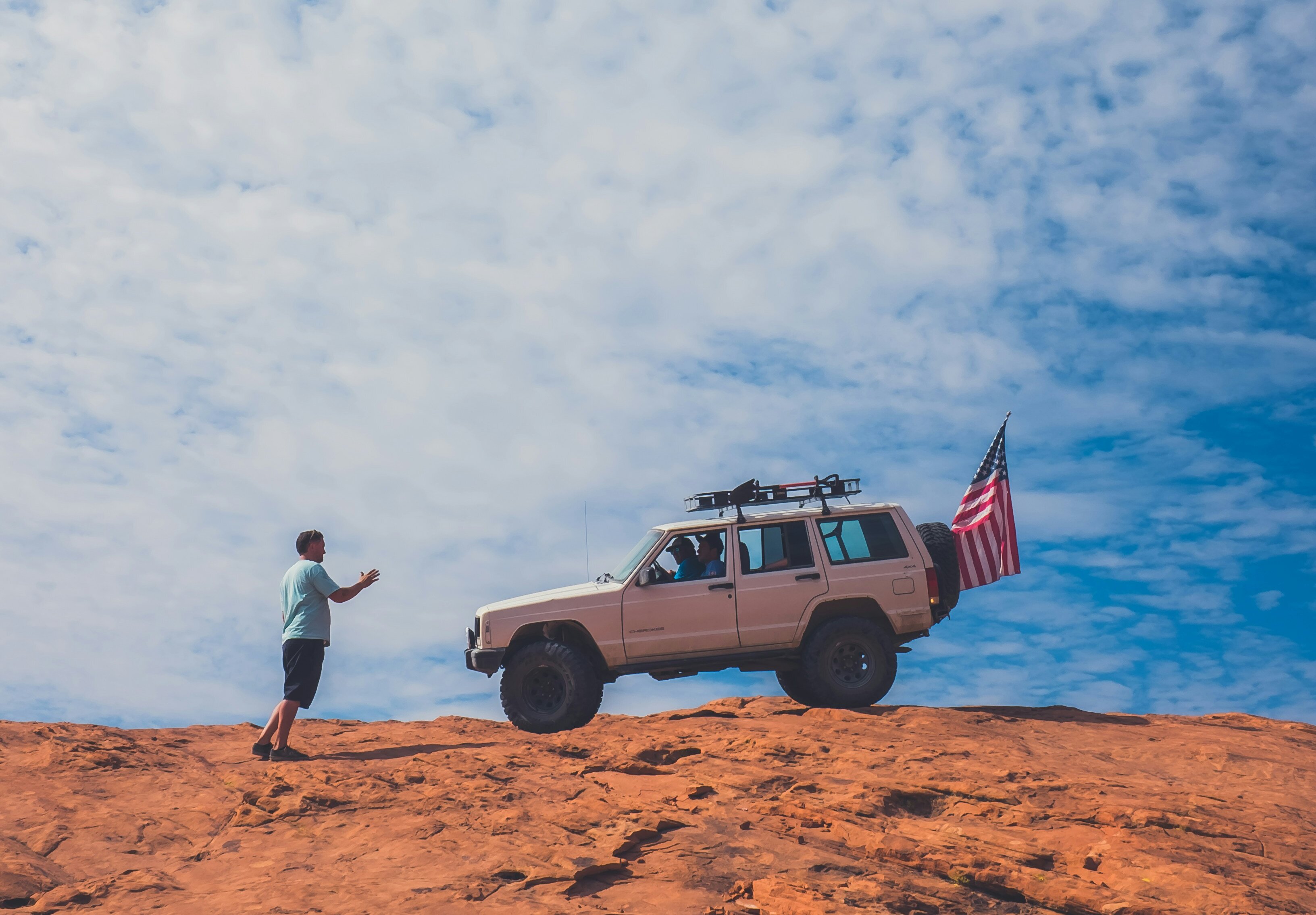 Person standing near vehicle